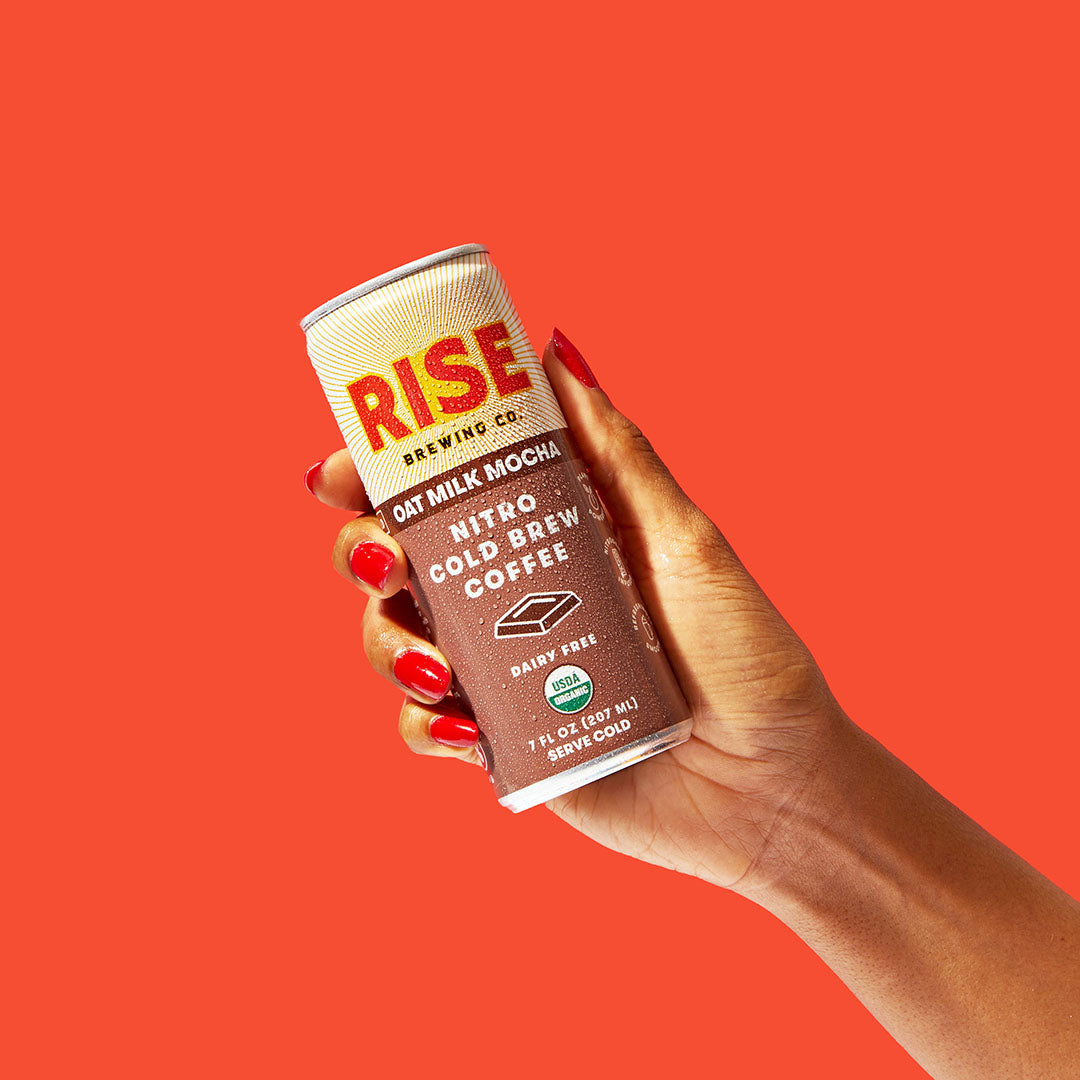 RISE Brewing Co. Oat Milk Mocha Nitro Cold Brew 7oz hand