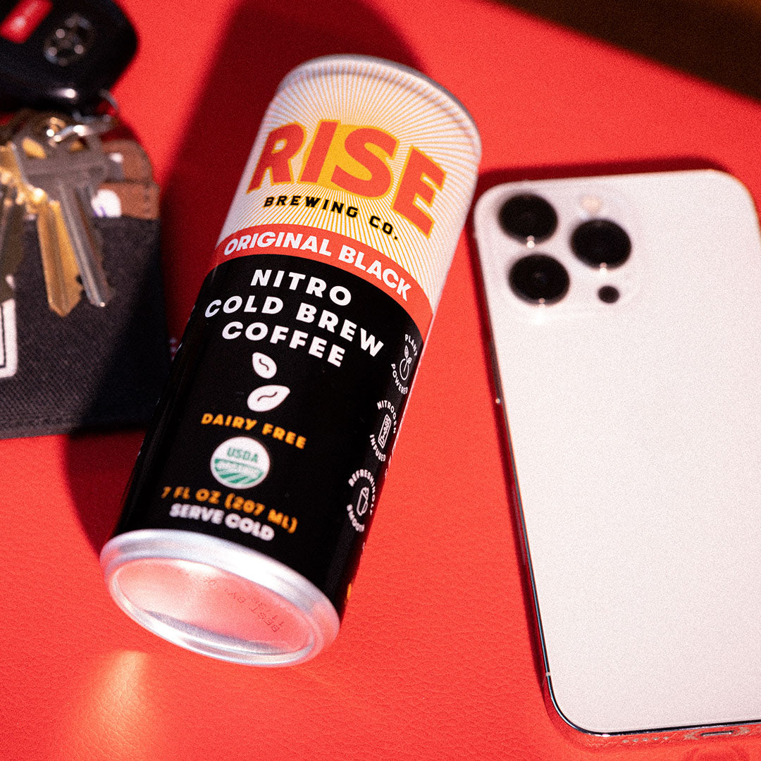 RISE Brewing Co. Nitro Cold Brew Original Black phone and keys